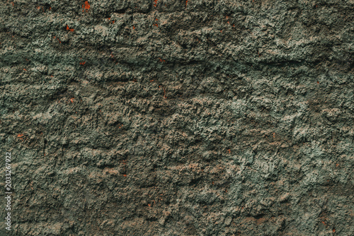 Foto A close-up view of a coarse, uneven concrete wall showing signs of age and wear