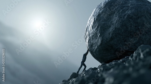 Businessman pushing giant boulder up steep hill