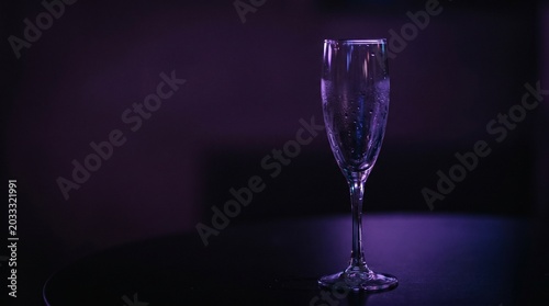 Neon purple champagne glass for VIP nightlife hospitality