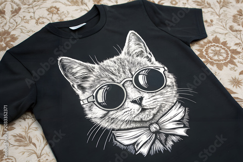 A highly detailed black and white illustration of a cat wearing stylish sunglasses, centered on a dark background t-shirt design 