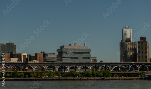 Scenic West Harlem shore vista on a sunny summer day taken from a boat, Manhattan, New York City