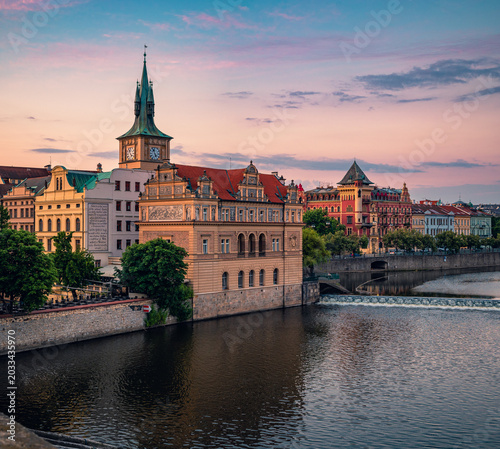 Sunrise Reflections by Prague’s Historic Riverside