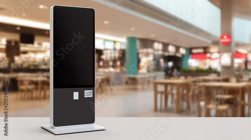 Modern digital kiosk in a shopping mall, showcasing advanced technology for quick transactions and information access.