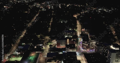 Ithaca, NY, USA - 05-18-2026  Night aerial hyperlapse video of downtown, commons, on a spring evening.