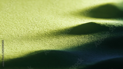 Grainy noise texture abstract close-up backdrop, varied green tones gradient layout, soft blended organic shadow undulation shape, ideal for digital decoration and atmospheric graphic creation