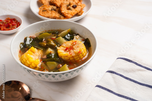 Sayur Asam or Sayur Asem is a type of vegetable dish that is typical of Indonesia. Perfect for recipe, article, catalogue, or any commercial purposes. with copy space.