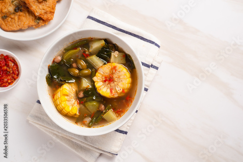 Sayur Asam or Sayur Asem is a type of vegetable dish that is typical of Indonesia. Perfect for recipe, article, catalogue, or any commercial purposes. with copy space.