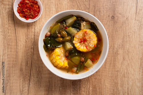 Sayur Asam or Sayur Asem is a type of vegetable dish that is typical of Indonesia. Perfect for recipe, article, catalogue, or any commercial purposes. with copy space.