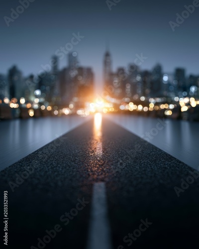 Road on a conference table leading toward city skyline as business roadmap concept