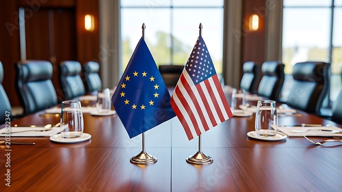 European Union and United States flags on conference table representing international diplomacy