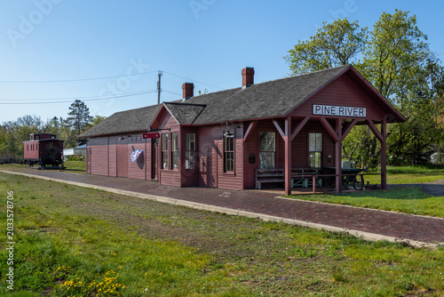Historic Pine River Train Depot and Railroad Caboose in Rural Minnesota on Former Railway Line