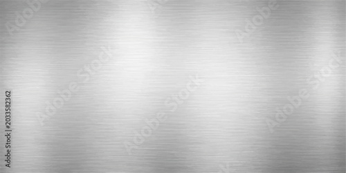 Photos A polished stainless steel plate featuring a shiny brushed silver metallic textu
