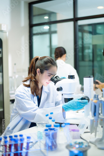 Medical team having a meeting with doctors. Young scientists conducting research investigations in a medical laboratory