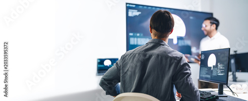 Adult latin engineer programmer presentation coding AI artificial intelligence algorithm coder training monitor developer expertise programming IT technology career