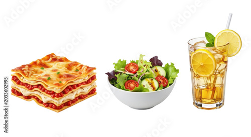 Fresh summer meal with lasagna, salad, and iced lemonade on white background