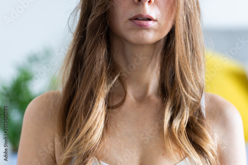 Quadro su tela Close-up of a woman with long hair indoors