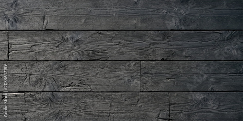 Photos A dark weathered black wood texture and natural brown wooden plank background sh