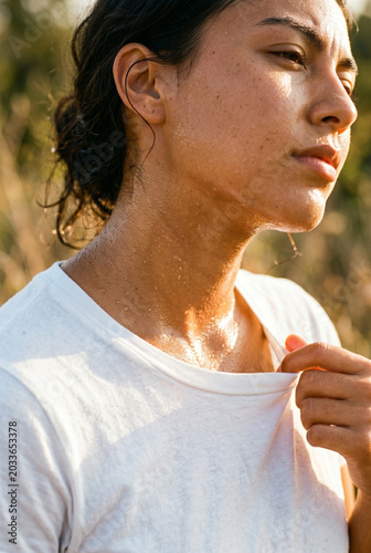 Sweaty Woman Exhausted by Extreme Summer Heatwave Outdoors