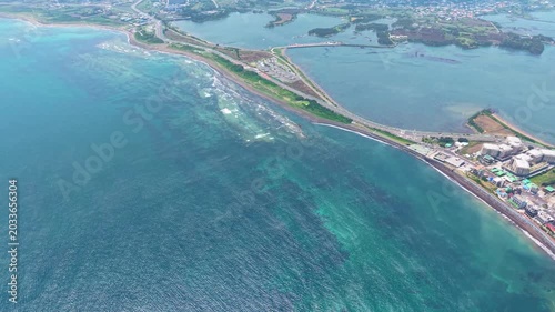 Aerial drone view of Gwangchigi Beach and Seongsan Ilchulbong coastline in Jeju Island South Korea