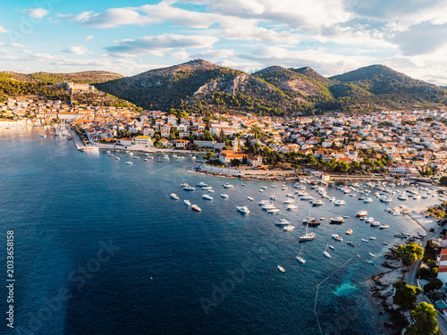 Aerial view of the historic Hvar town and the Spanish Fortress (Fortica) overlooking the harbor and Adriatic sea, Hvar island, Dalmatia, Croatia.