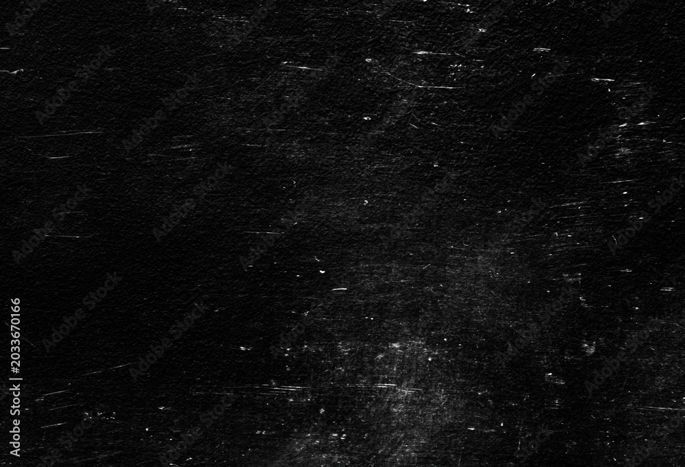 Fototapeta premium Old black stucco wall with white scratches and scuffs texture. textured grunge black board with chalk