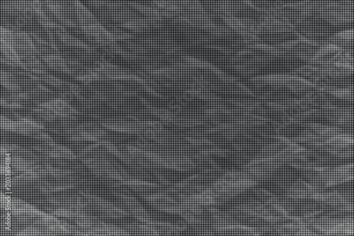 Crinkled gray paper texture with transparent background on a flat surface close-up