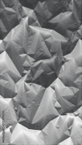 A grayscale image of crumpled paper showcasing a complex pattern of folds and creases on a surface.