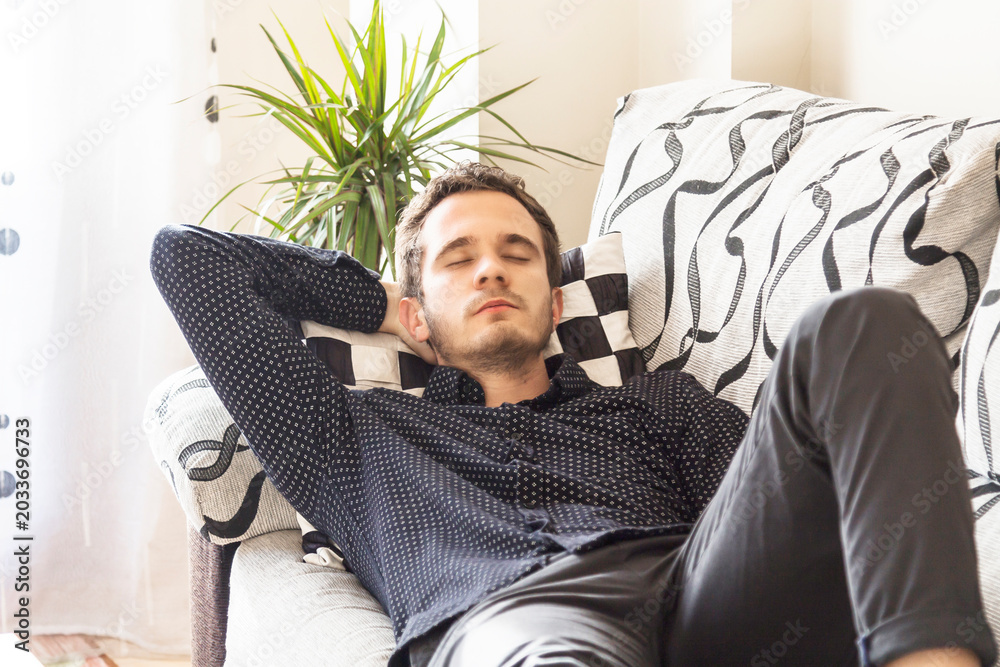 Fototapeta premium man at home relaxed resting