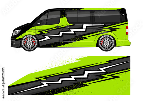 Bright green van with jagged lightning bolt graphic wrap.