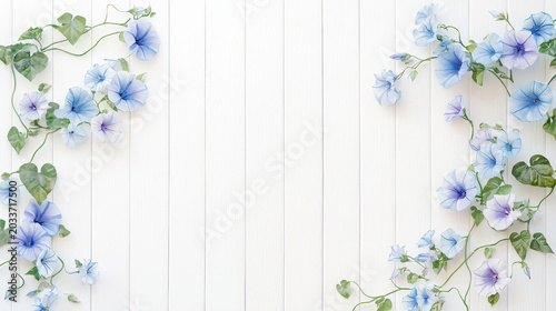 Delicate watercolor illustration of blue and purple flowers with green leaves on white wooden background, creating serene atmosphere