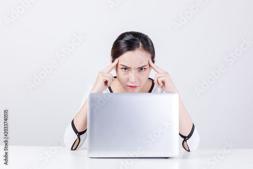 Φωτογραφία Frustrated businesswoman concentrating at laptop