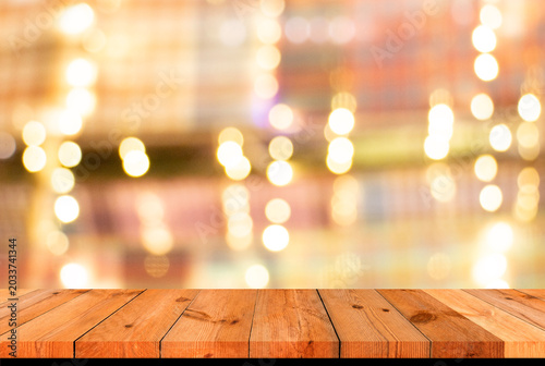 perspective wooden board over bright abstract background