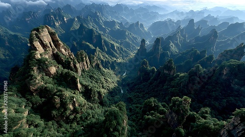 Mountain range with lush green forests and dramatic rock formations mountains landscape