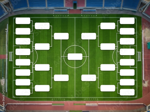 Soccer bracket template on green football field in stadium