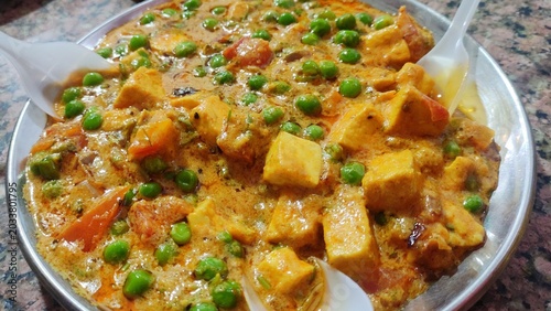 Matar Paneer is a classic North Indian dish made with green peas (“matar”) and paneer (Indian cottage cheese) cooked in a spiced tomato-onion gravy..