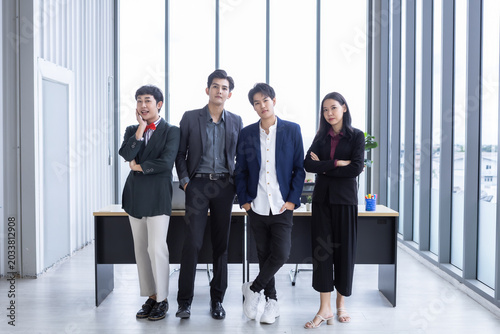 Successful happy workers Group of asian business people with diverse genders (LGBT) workers with in company workers Group of asian business people and support in the meeting room at office