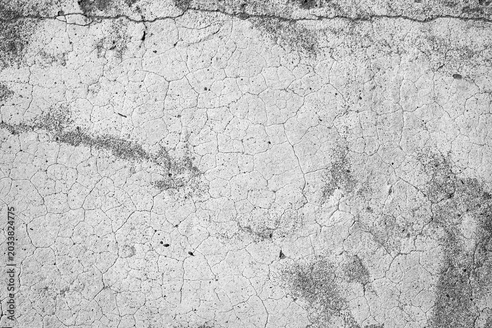 Fototapeta premium Cracked concrete surface with dust and dirt particles