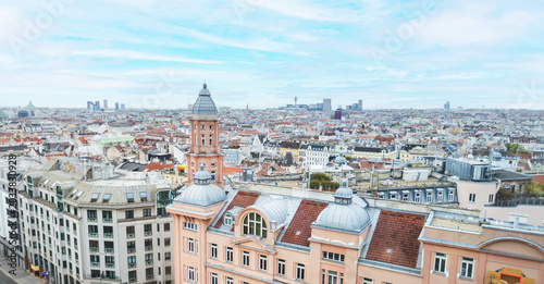 Vienna cityscape panorama with historic red rooftops and urban skyline view
