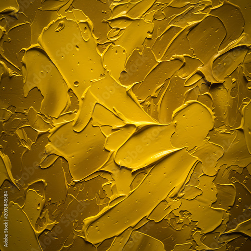 Thick golden paint texture with impressionistic brushstrokes and dramatic lighting