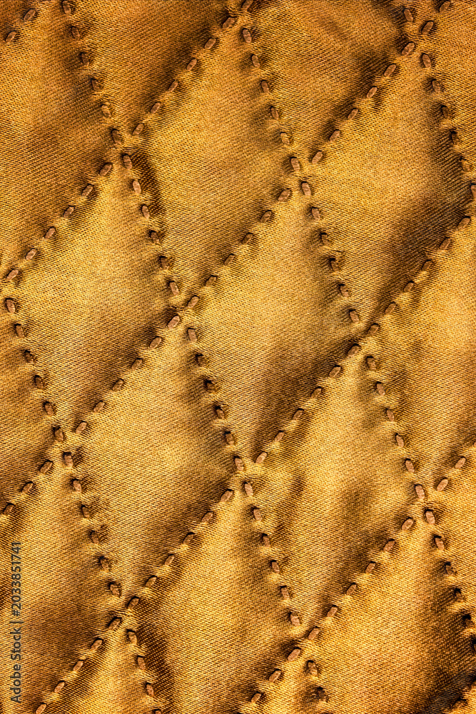 Fototapeta premium Quilted Golden Fabric With Diamond Stitching