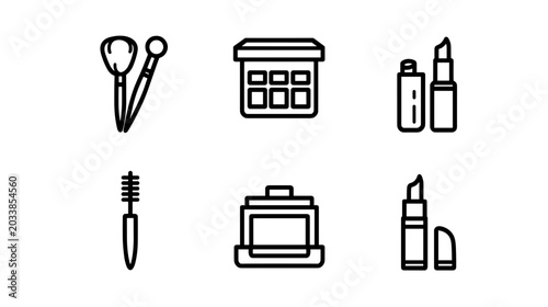 Fotografie Collection of Makeup Tools and Accessories Including Lipstick and Brushes on Whi