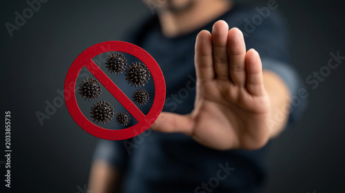 Stop Virus: A person holds ...
