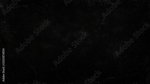 Bild auf Leinwand Dark textured surface with scratches and marks on a black background