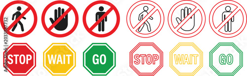 Foto Traffic and road signs with stop wait go and no entry symbols
