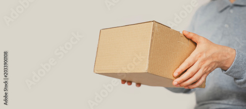 Photography Cargo staff are delivering cardboard box