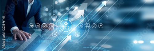 Quadro su tela Finance manager hand touch Enterprise Resource Planning software to unify business operations and data