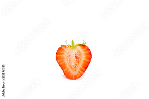 Juicy strawberry isolated on white background. strawberries sliced. Fresh, ripe organic berries. Vegan. Fruits. Vitamins. Strawberry slice.