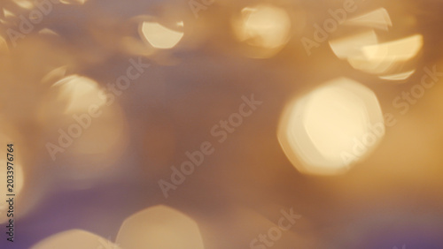 Quadro su tela Soft golden bokeh lights create a warm and magical festive holiday background