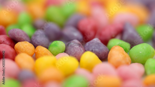 Foto Macro close up of colorful irregular sugar candies with shallow depth of field