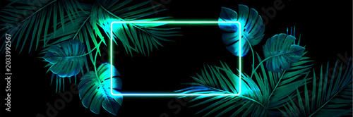 Foto Neon jungle frame with tropical palm leaves on black background